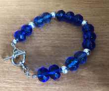 Load image into Gallery viewer, Faceted blue glass and silver bracelet
